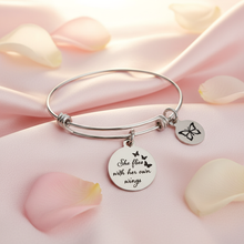 She flies with her own wings